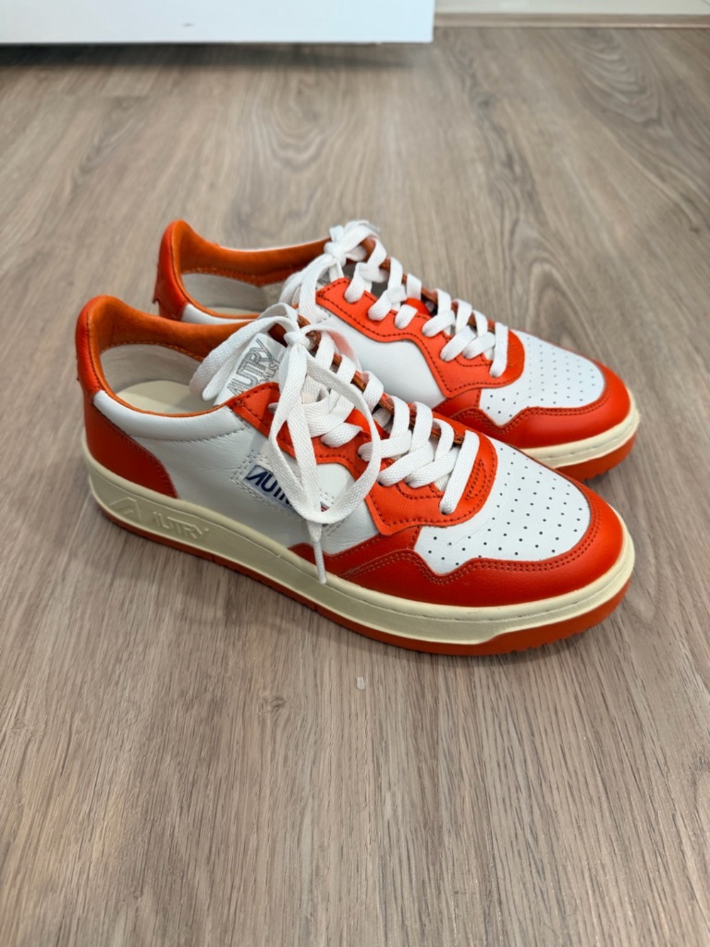 AUTRY Low-Top Orange & White Leather Sneakers with Cream Sole